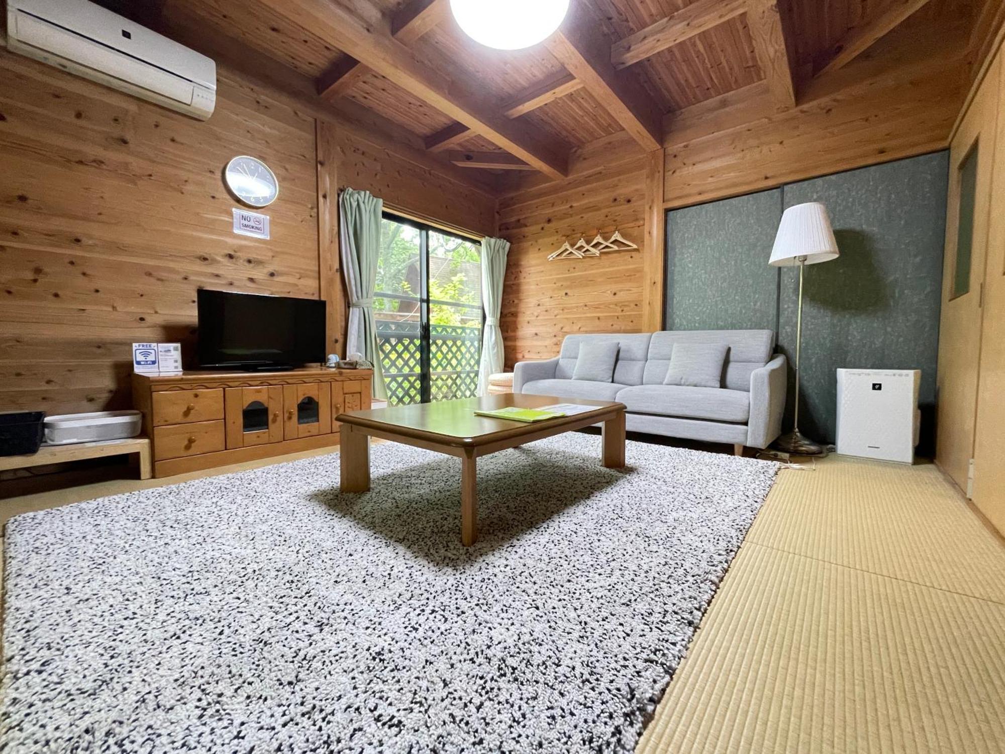 Kurasako Onsen Sakura Villa Minamioguni Buitenkant foto